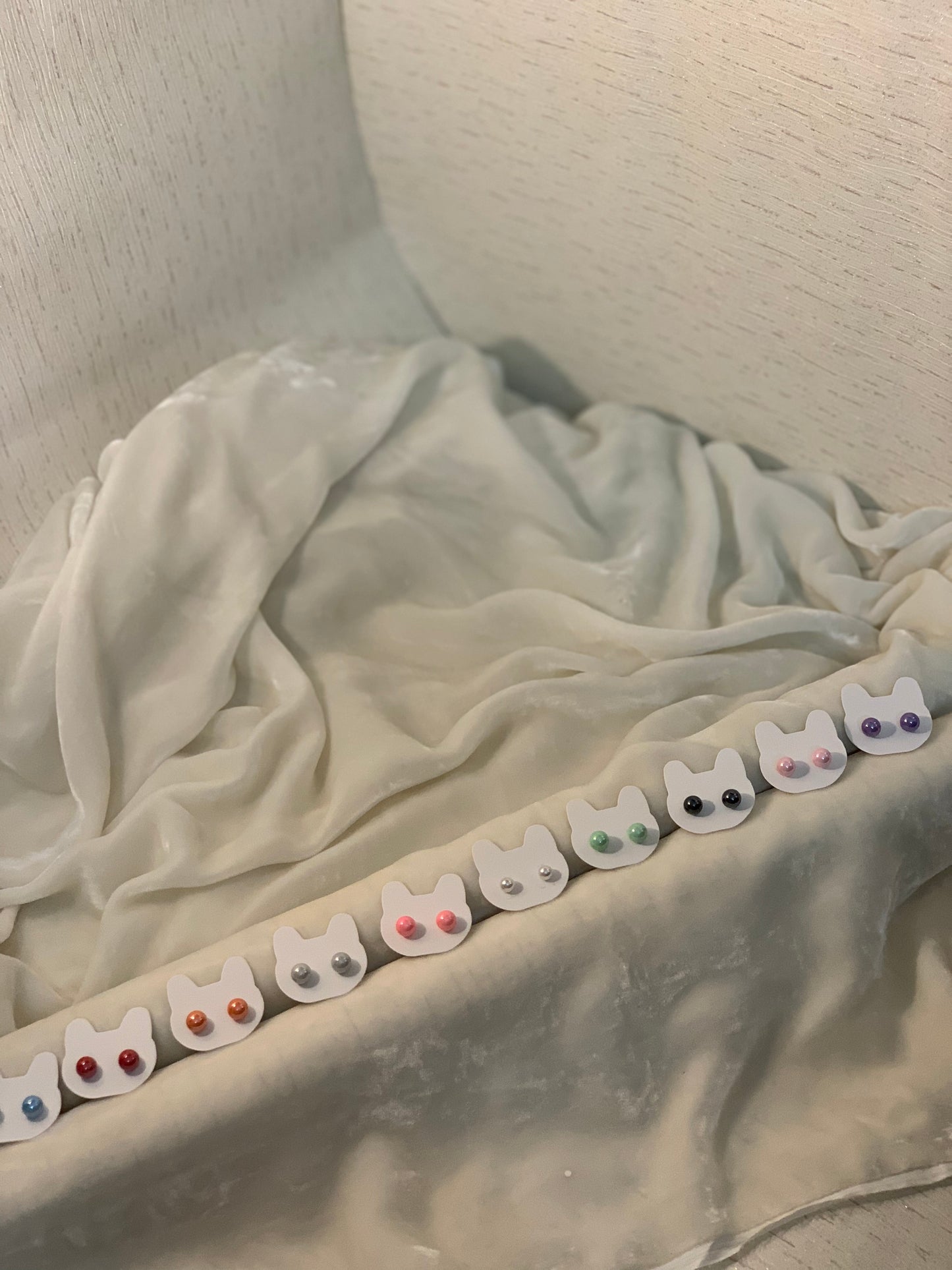 Tiny pearl studs