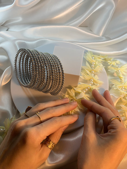 Silver Pearl bangles.