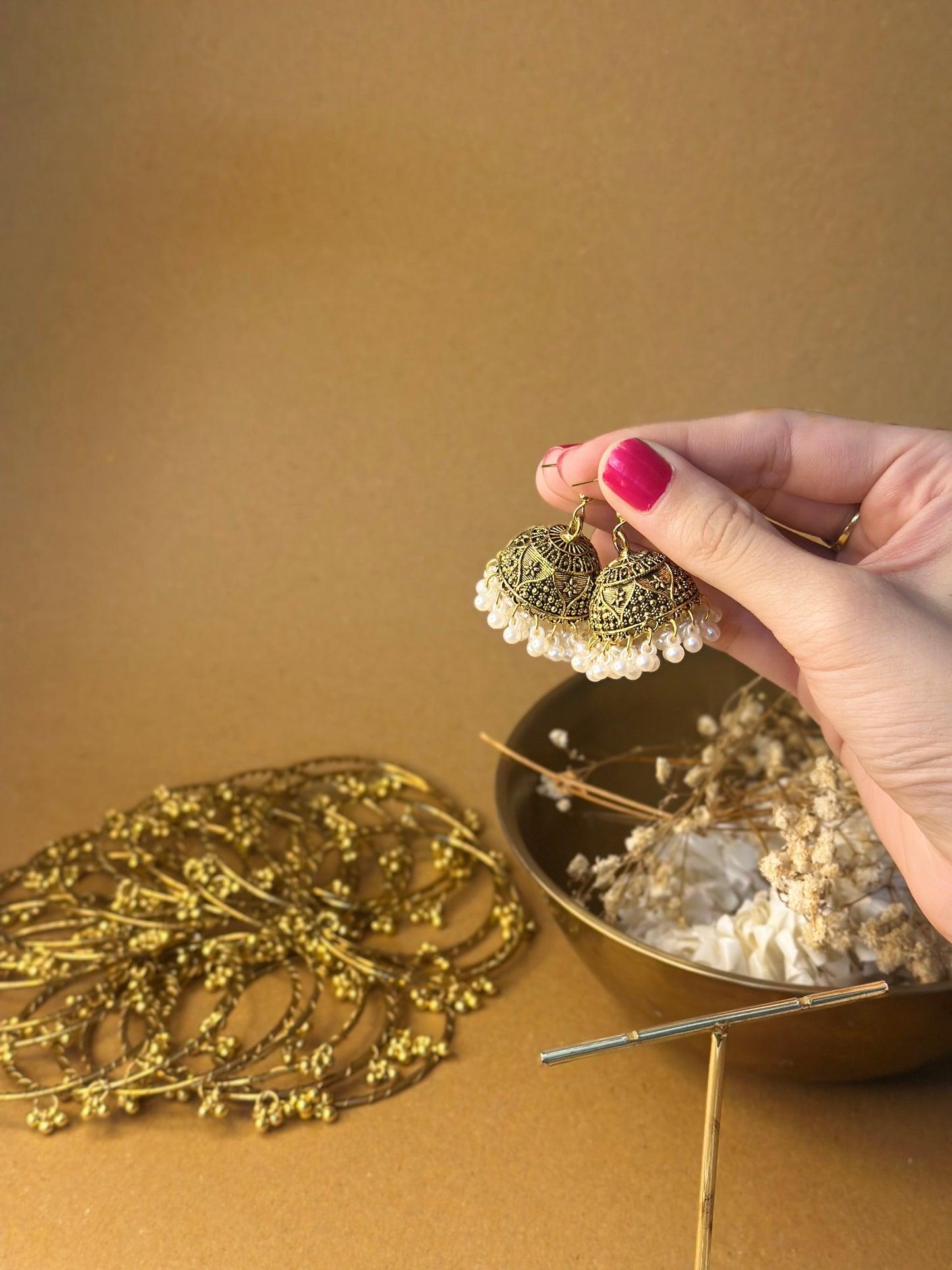 Gold jhumki with safaid moti and double layer saharay
