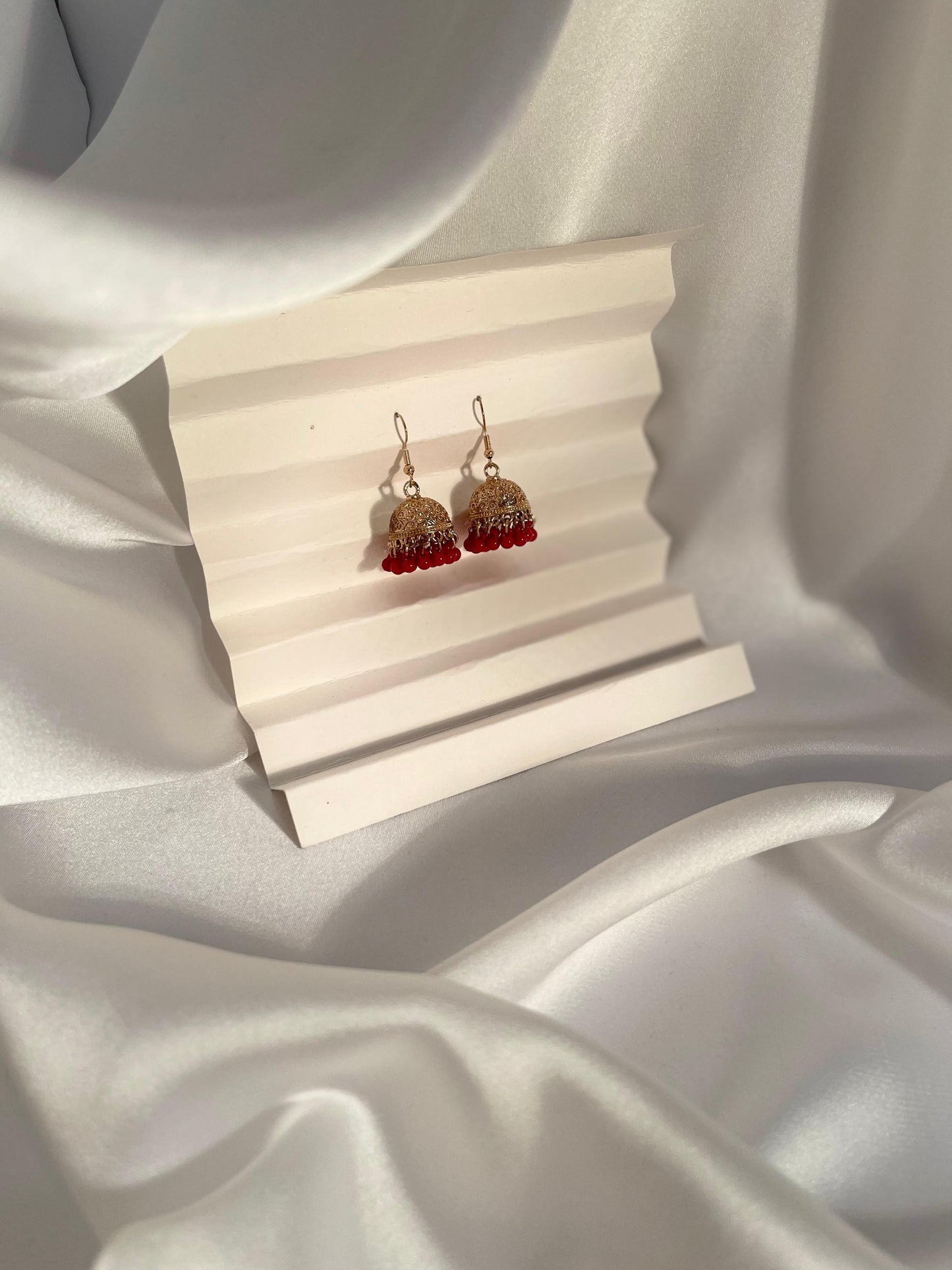 Tania gold Jhumki (red beads)