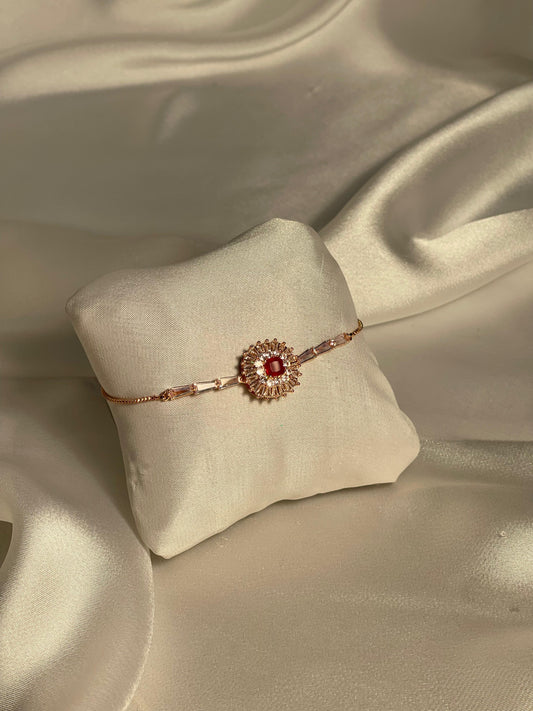 Phool bracelet gold with maroon gem