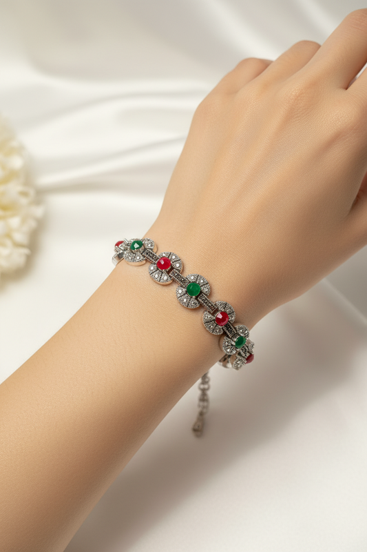 Silver Bracelet With green and red gem