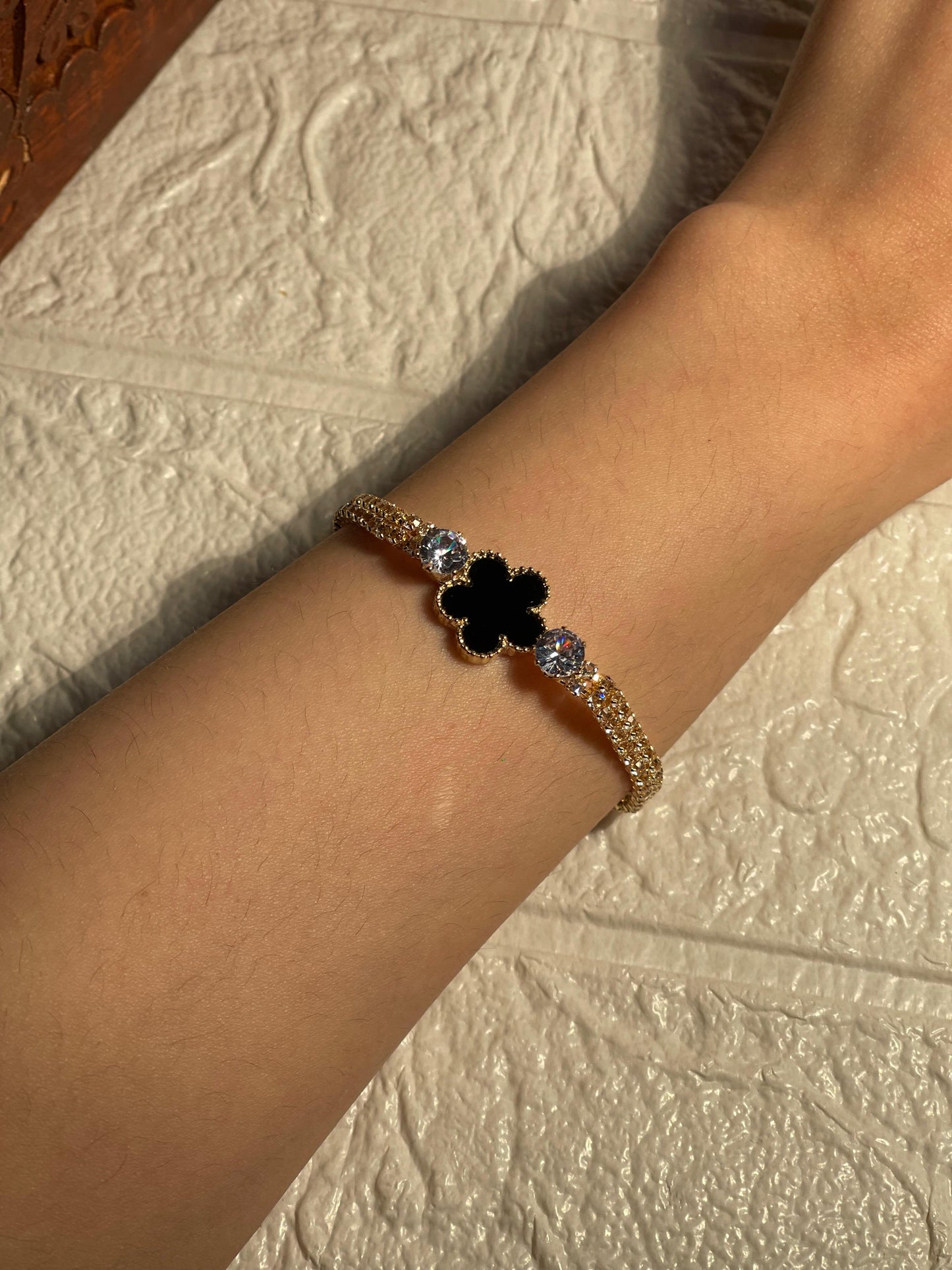 Gold and black flower bracelet(Mahnoorbano)