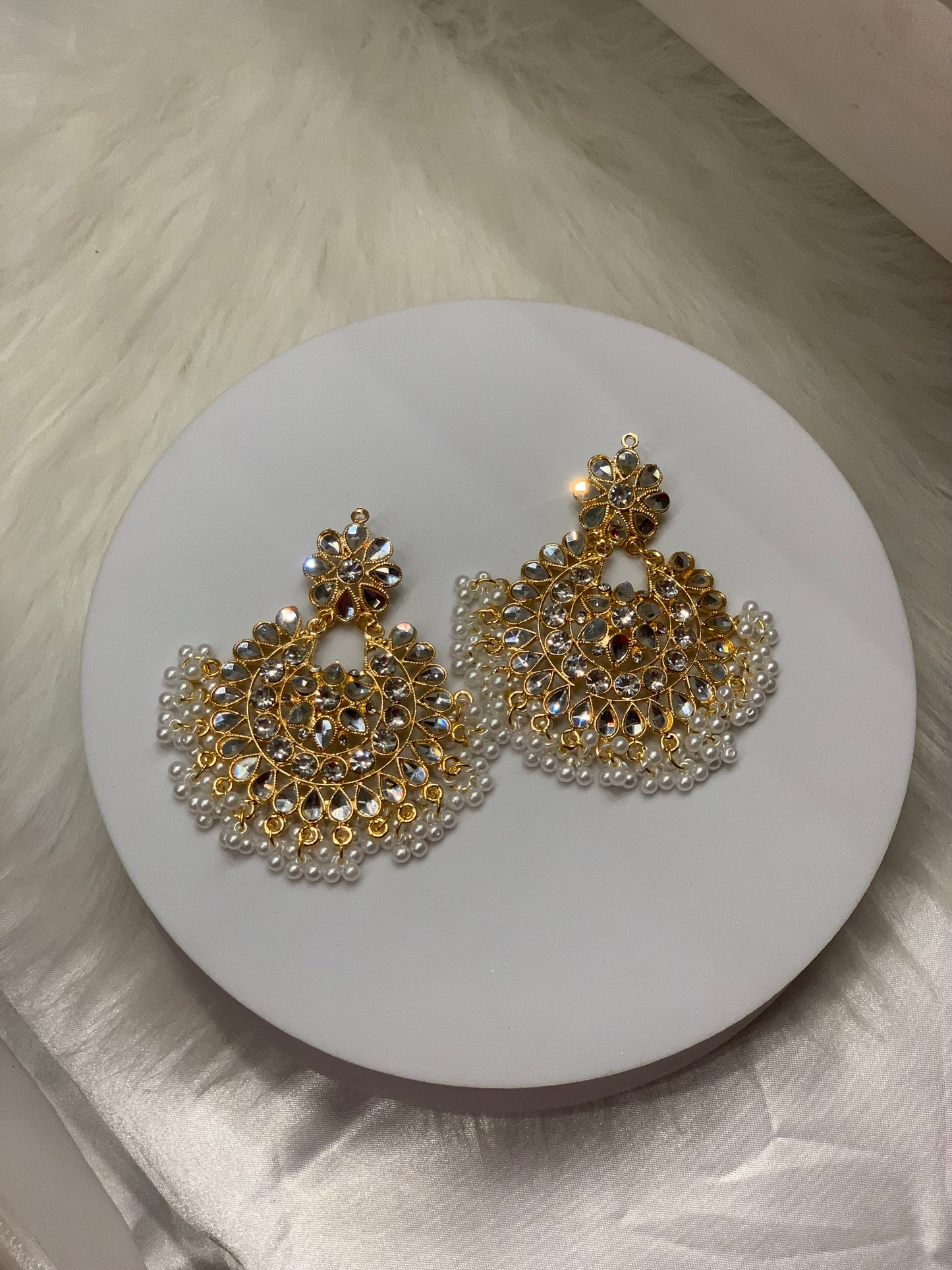 Kundan moti - gold and white.