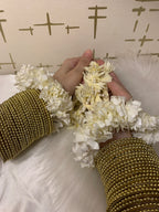 Gold Pearl bangles.