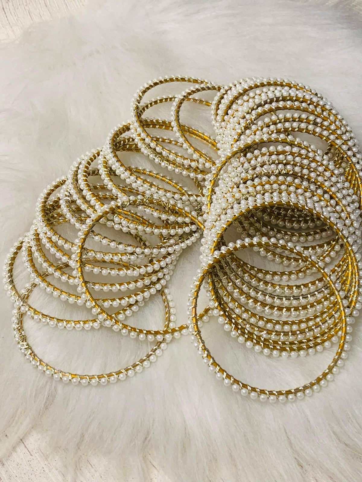 White Pearl Bangles.