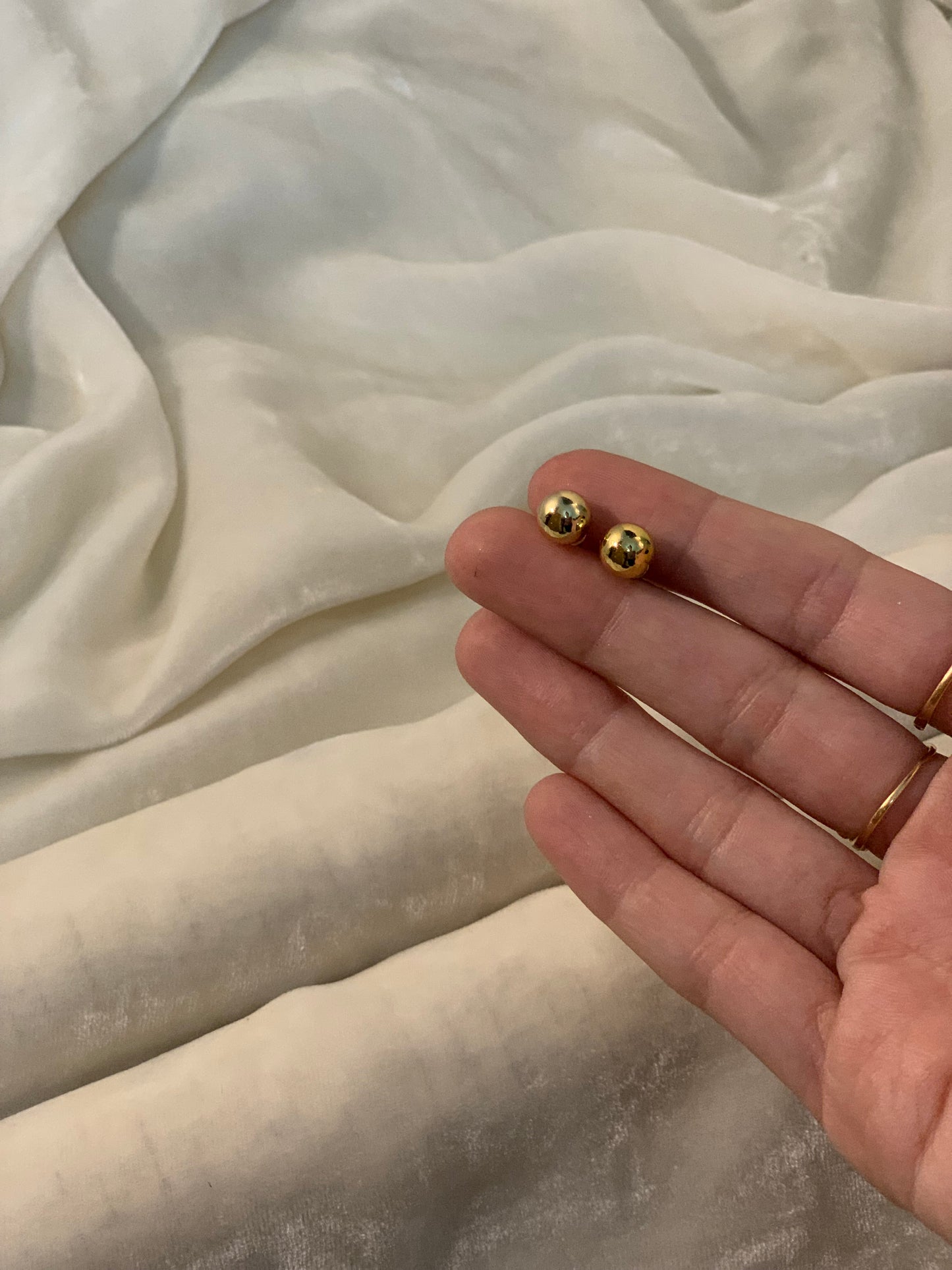 Gold round studs