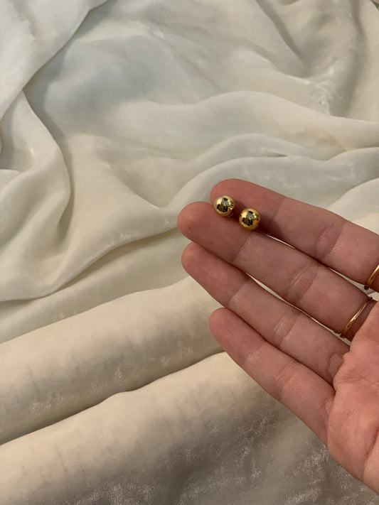 Gold round studs