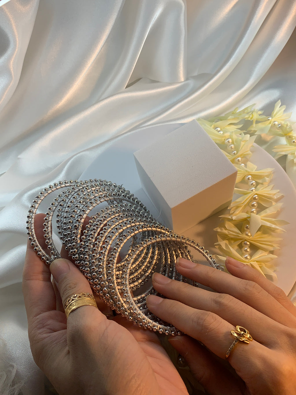 Silver Pearl bangles.