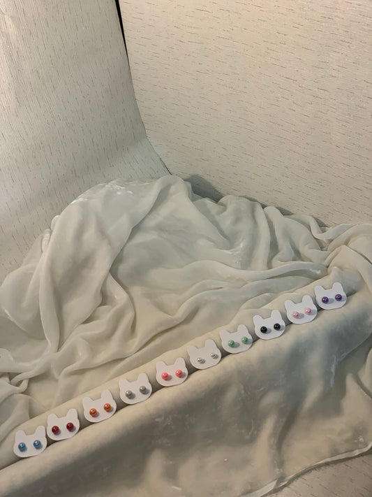 Tiny pearl studs