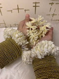 Gold Pearl bangles.