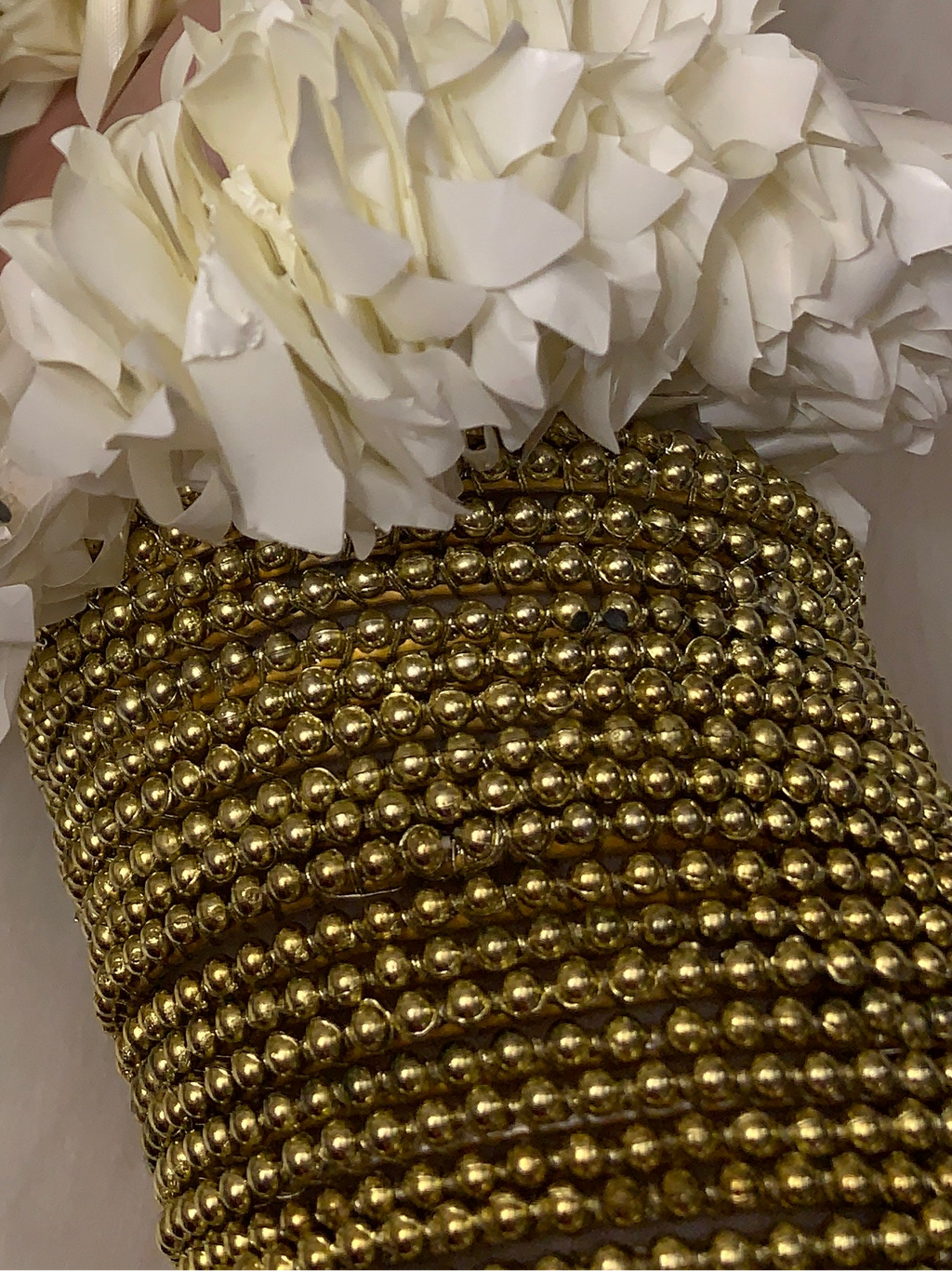 Gold Pearl bangles.