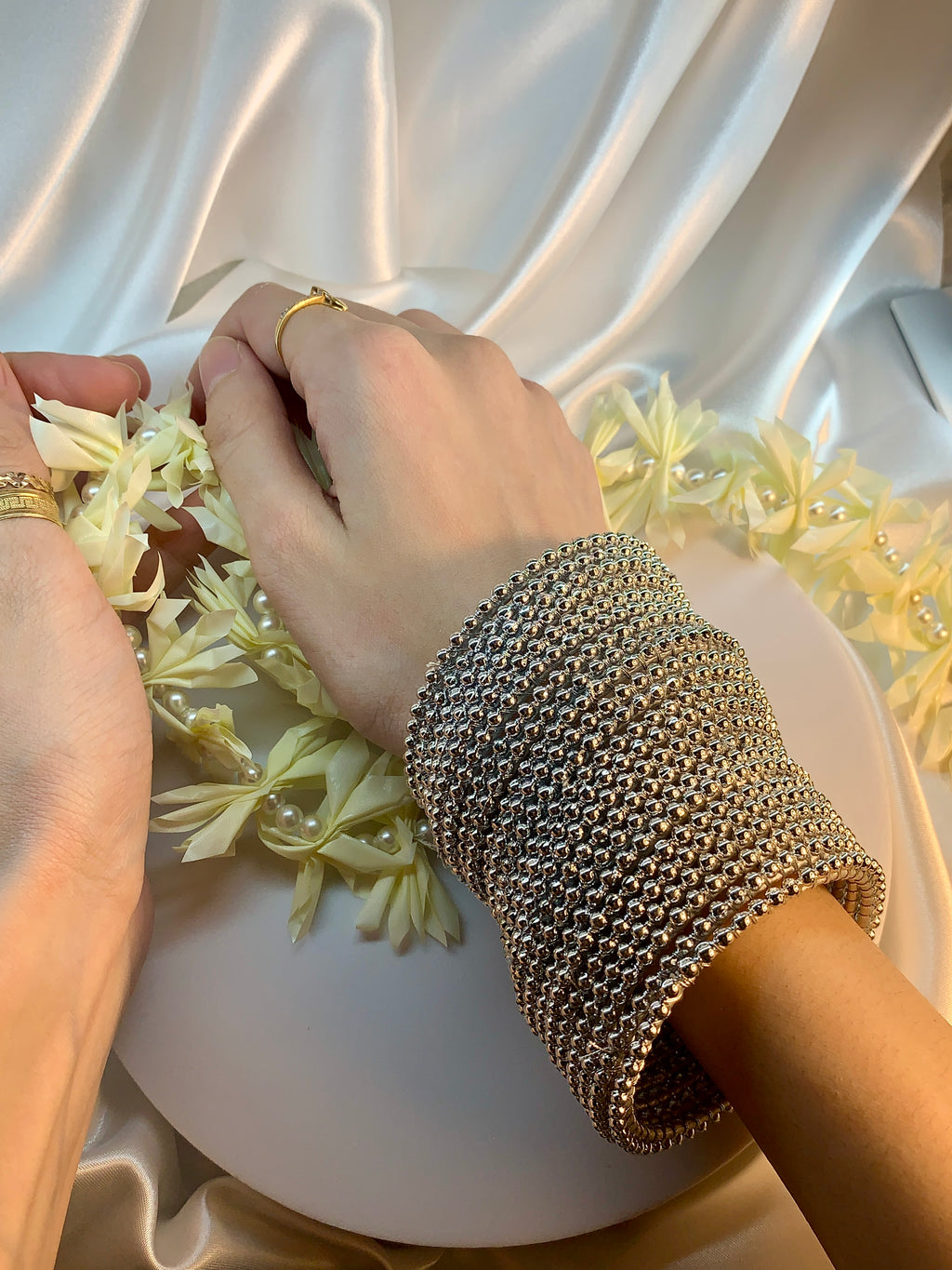 Silver Pearl bangles.