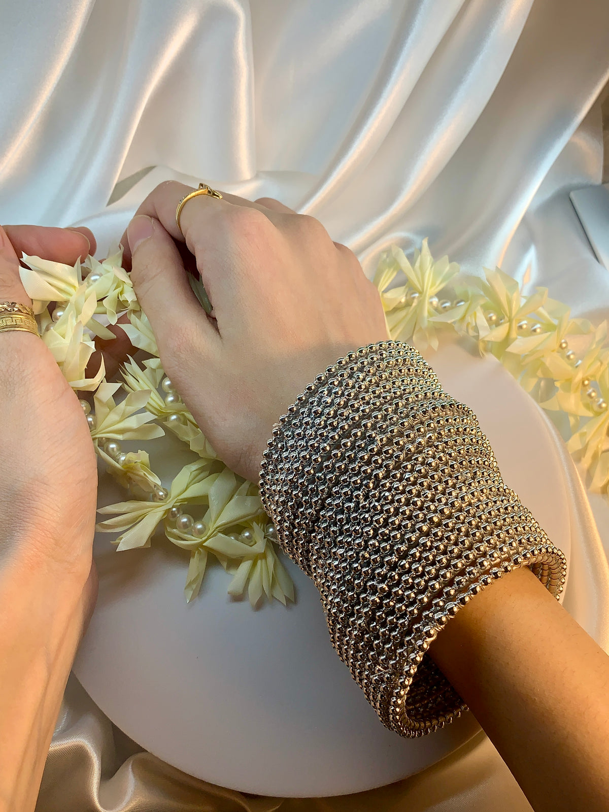 Silver Pearl bangles.