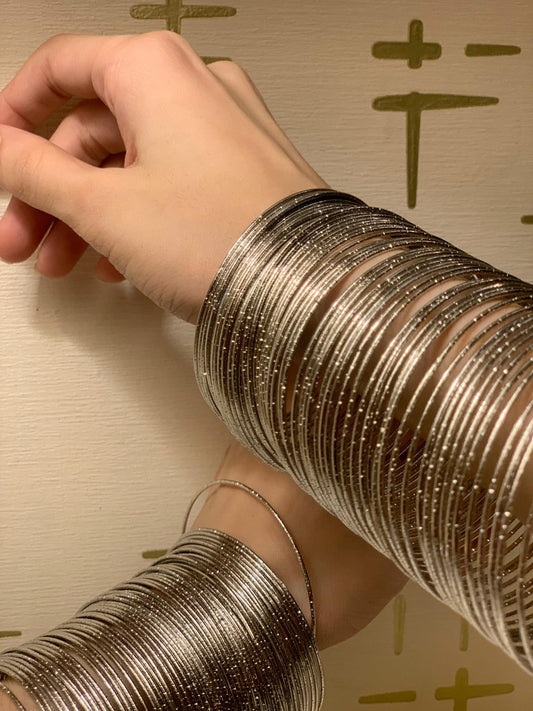 Viral silver bangles - both hands look