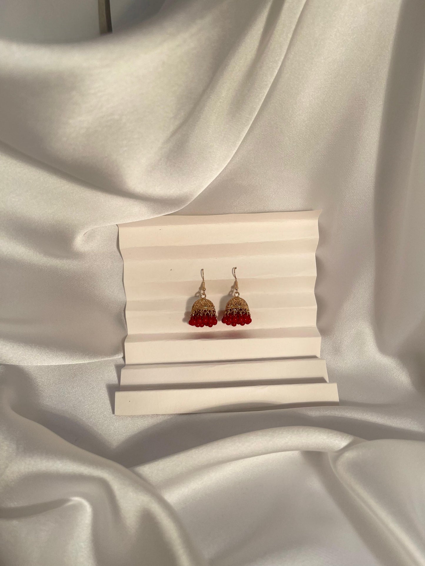 Tania gold Jhumki (red beads)