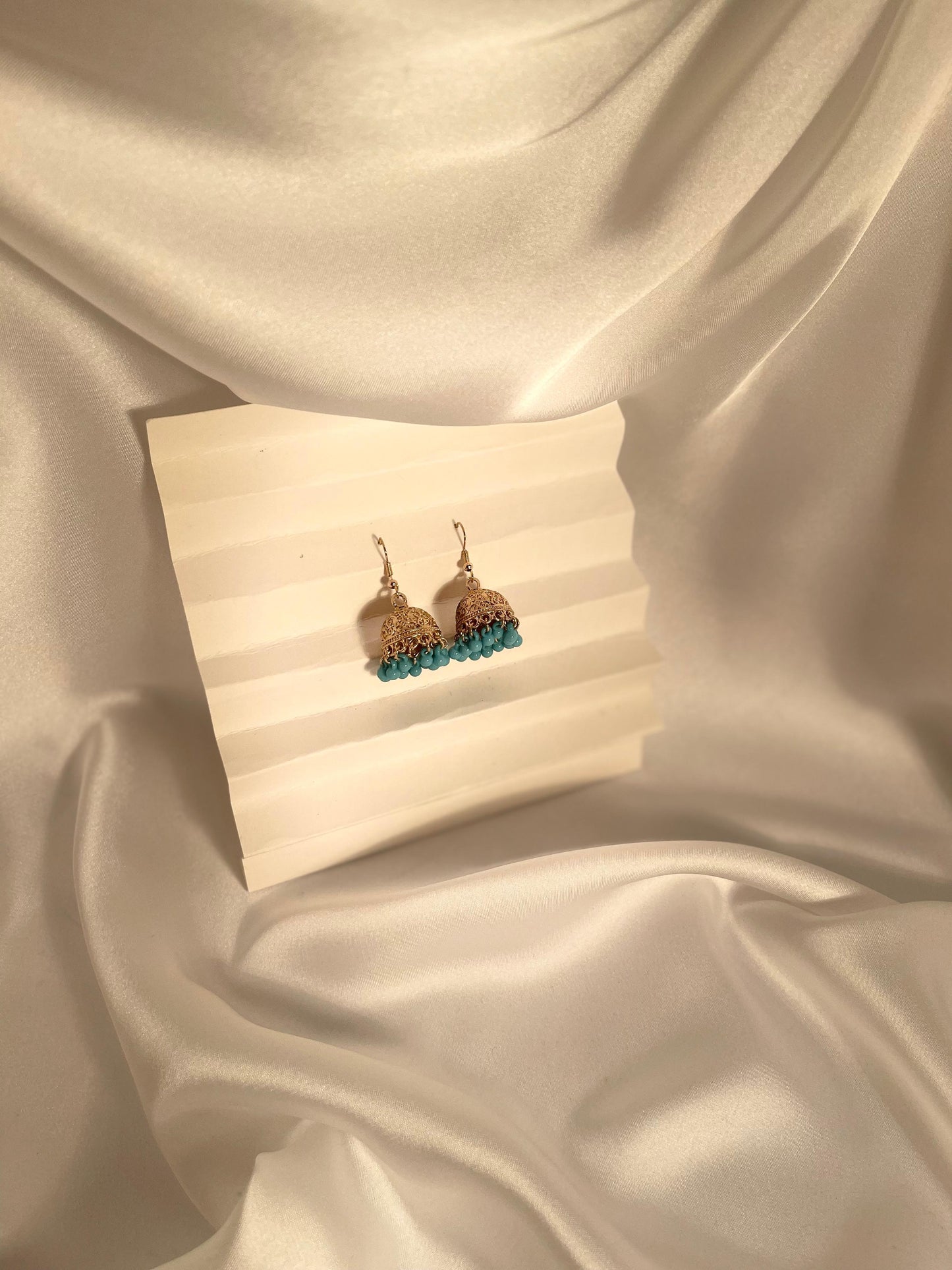 Tania gold Jhumki (sky blue beads)