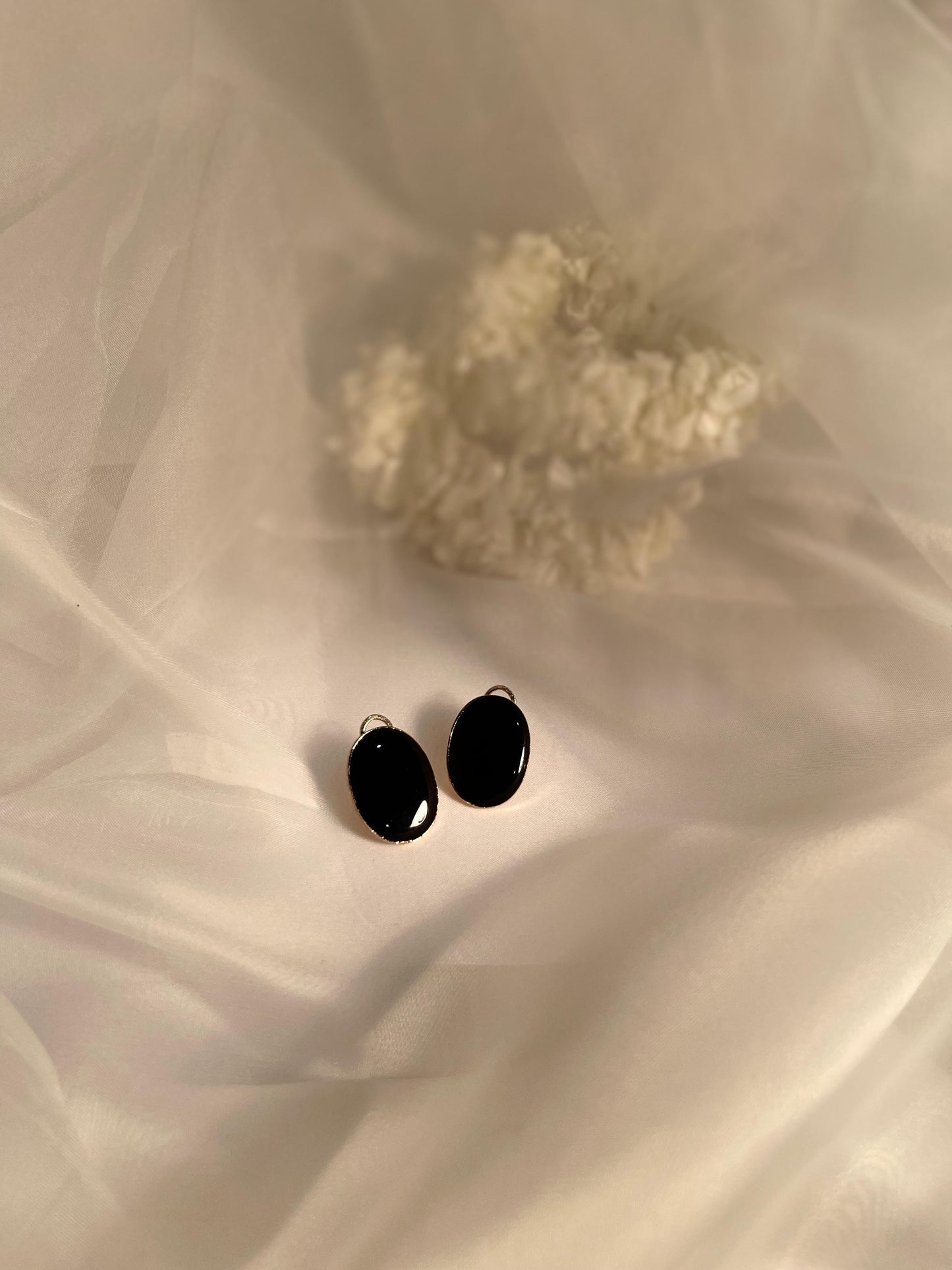 black oval earring