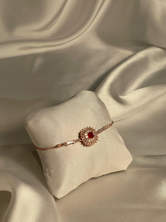Phool bracelet gold with maroon gem