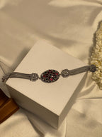 Silver Bracelet With maroon and green gem