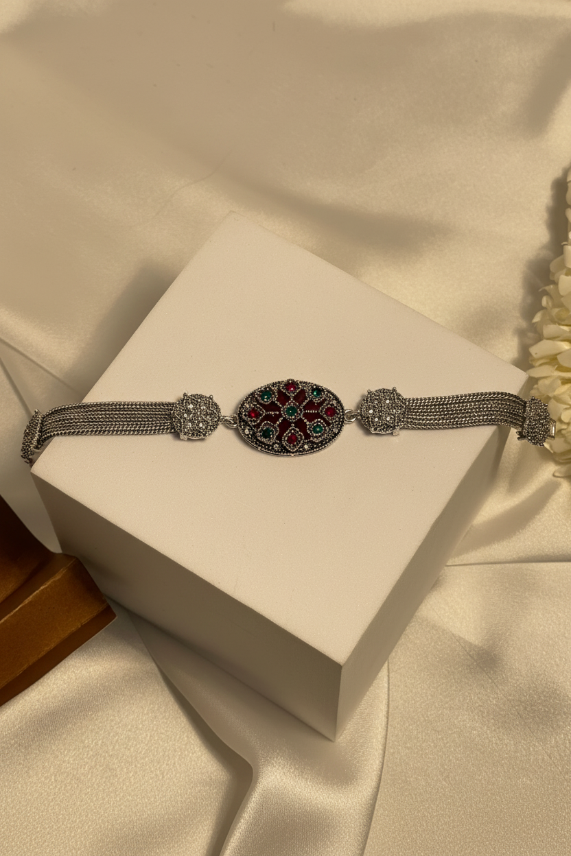 Silver Bracelet With maroon and green gem