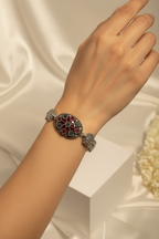 Silver Bracelet With maroon and green gem