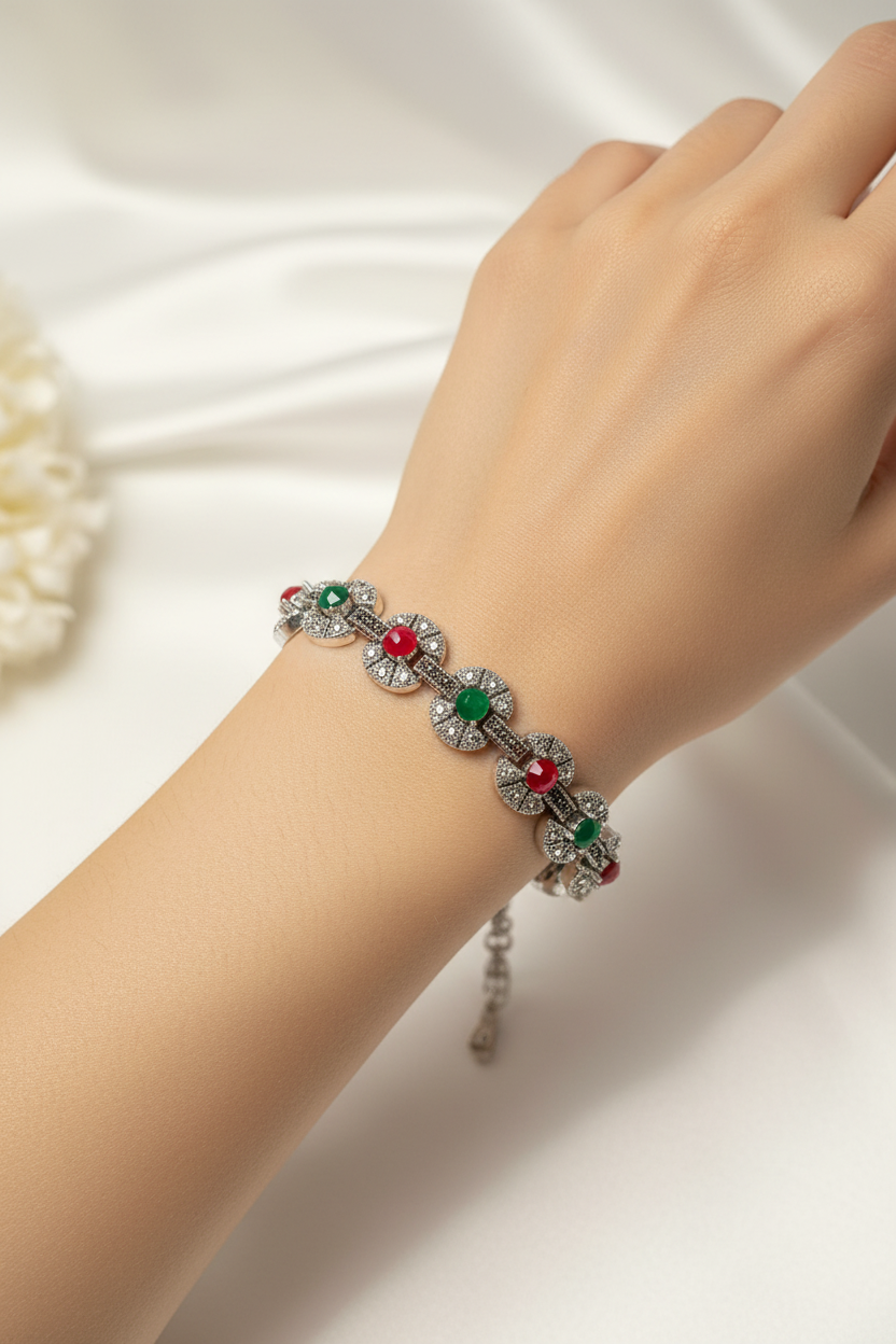 Silver Bracelet With green and red gem