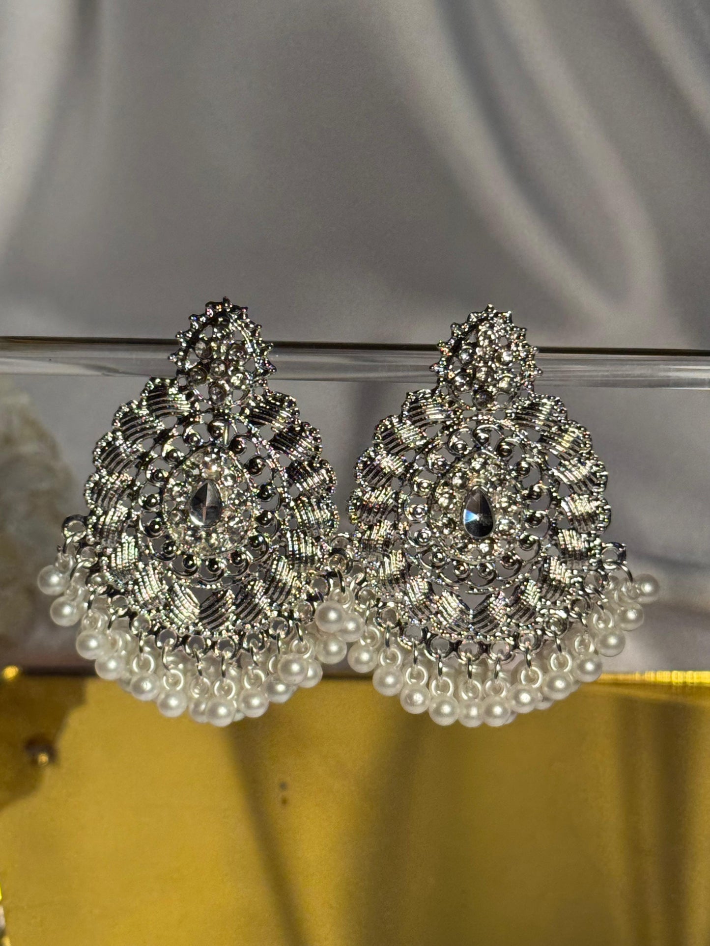 silver leaf with white moti- eid collection