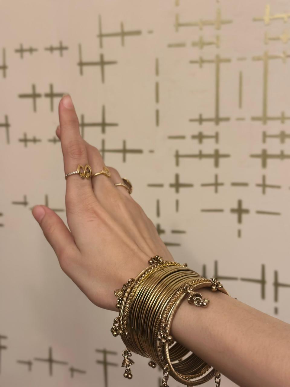 gold and ghungroo bangle set