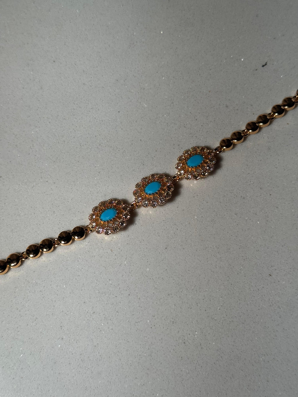 Trio floral bracelet gold and blue