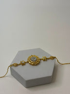 Gold round flower bracelet