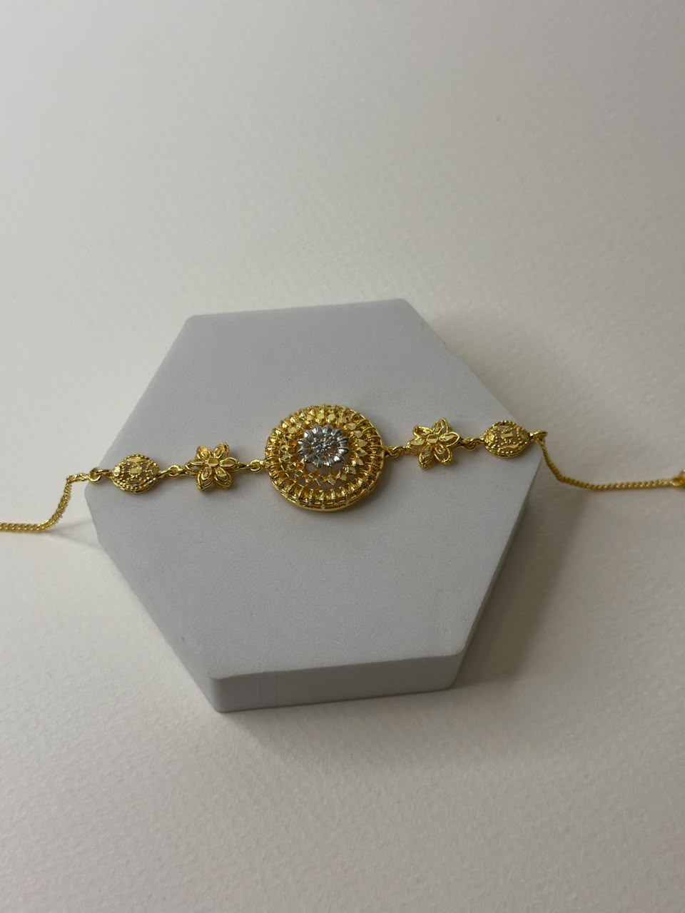 Gold round bracelet