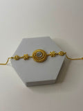 Gold round bracelet
