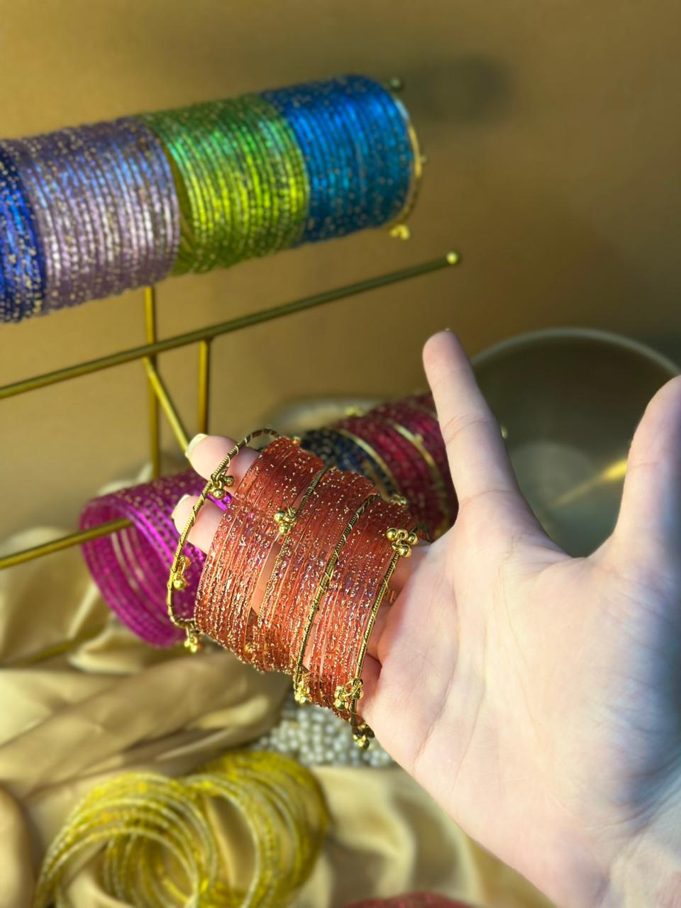 ghungroo bangle with orange raindrop bundle