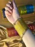 ghungroo bangle with yellow raindrop bundle
