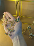 Patang (green and gold) and saharay bundle