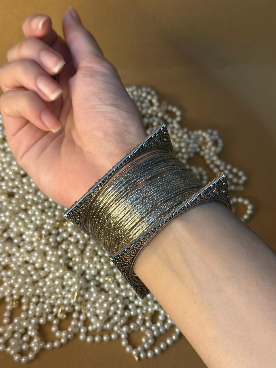 Chakoor bangle with silver bangle bundle