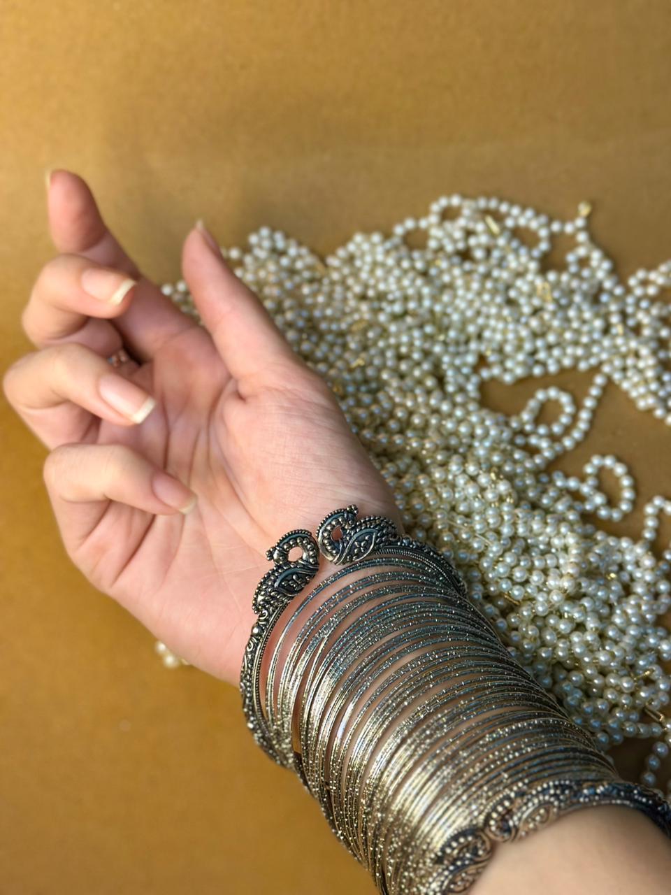 Hans with silver bangle bundle