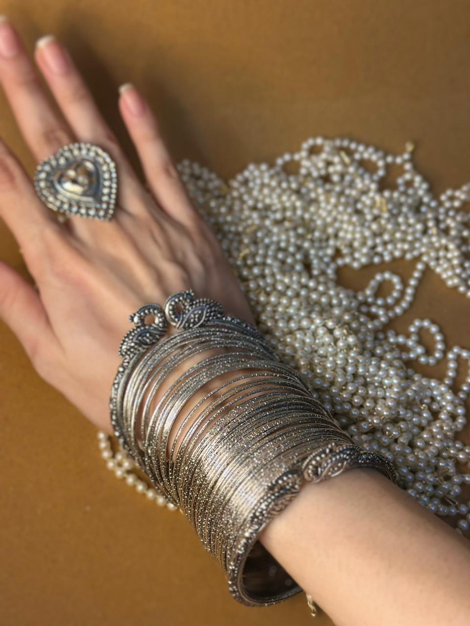 Hans with silver bangle bundle