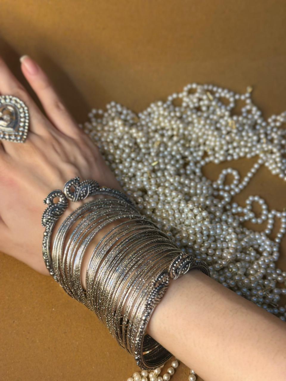 Hans with silver bangle bundle