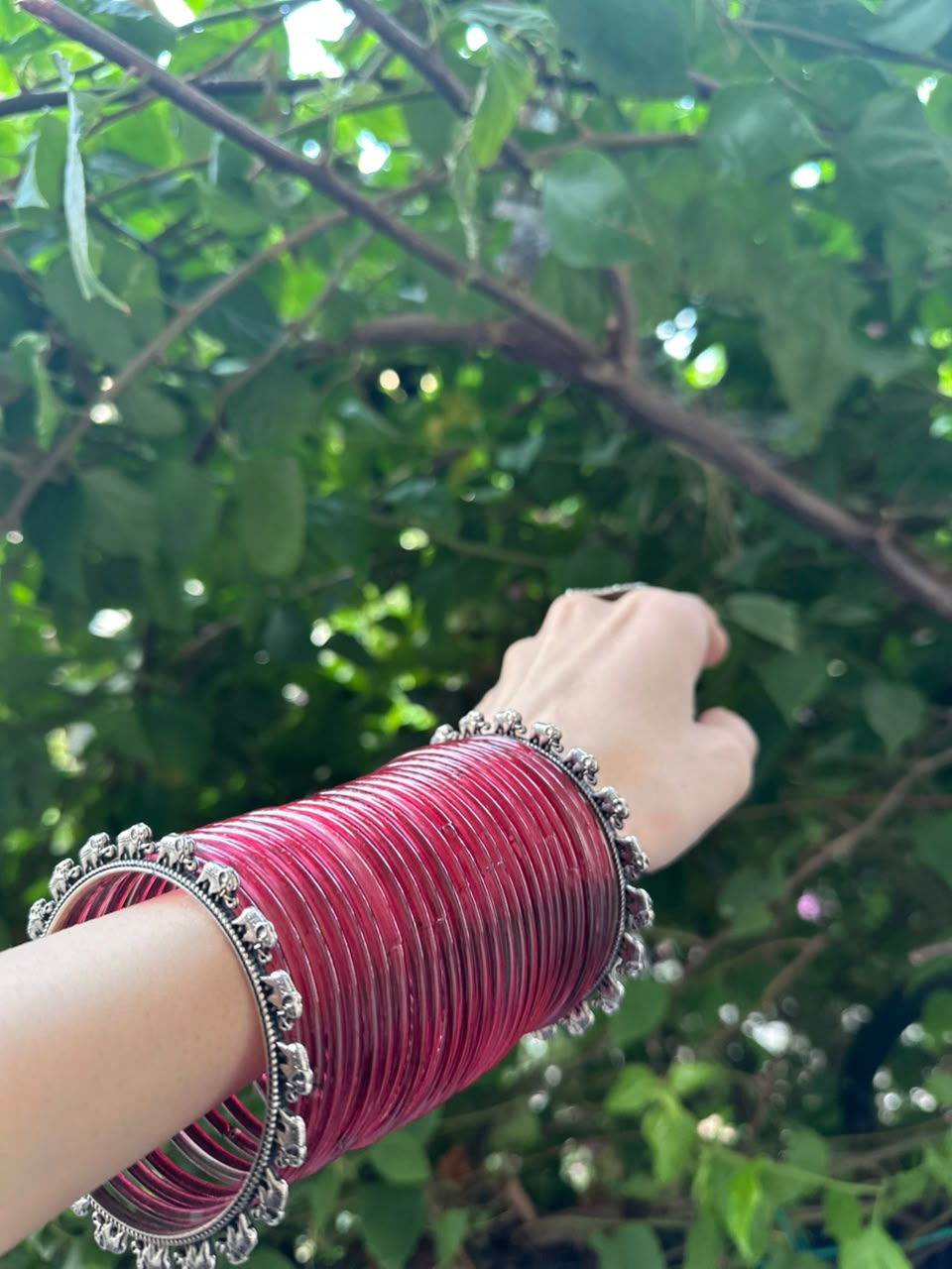 Maroon bangles with hathi bangle bundle
