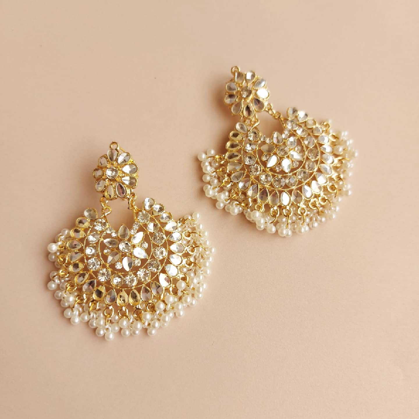Kundan moti - gold and white.
