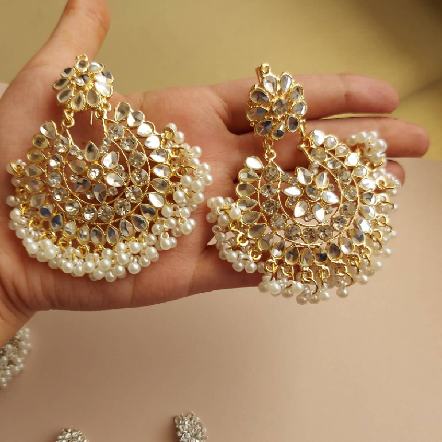 Kundan moti - gold and white.