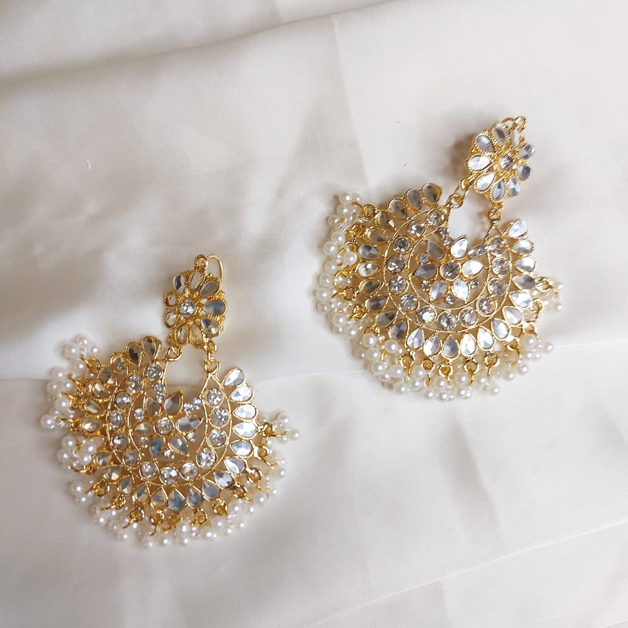 Kundan moti - gold and white.